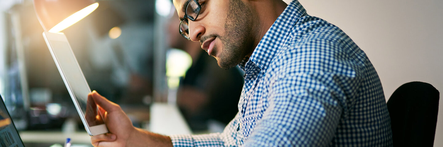 professional sitting at a computer