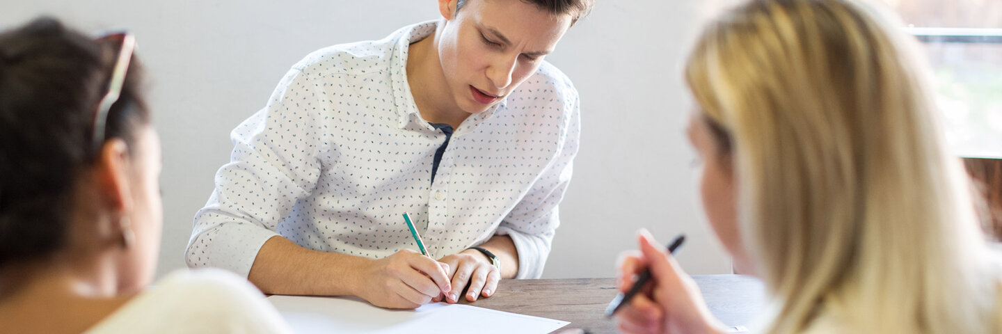 Writers at a writer's table