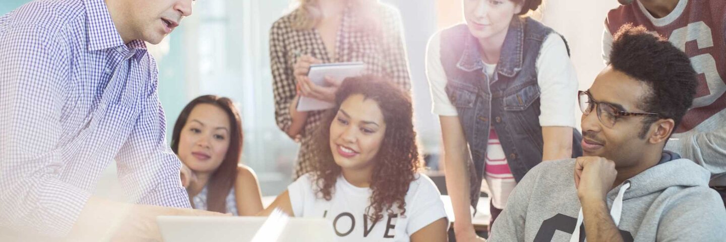 Administrator going over website with students