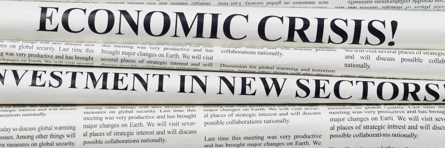 Stack of newspapers with headlines