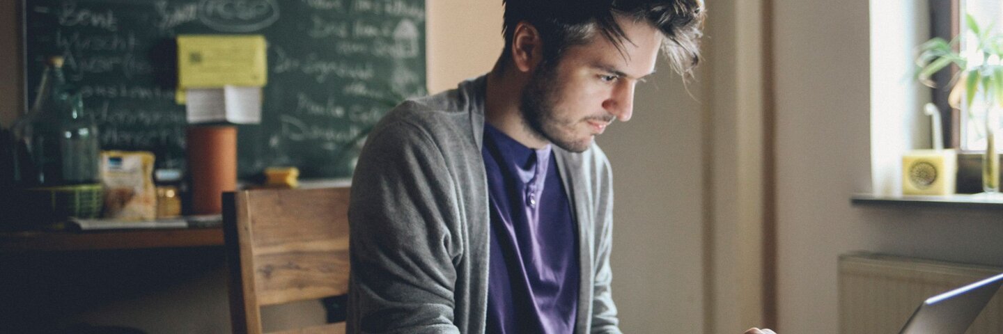 Man studying in his apartment