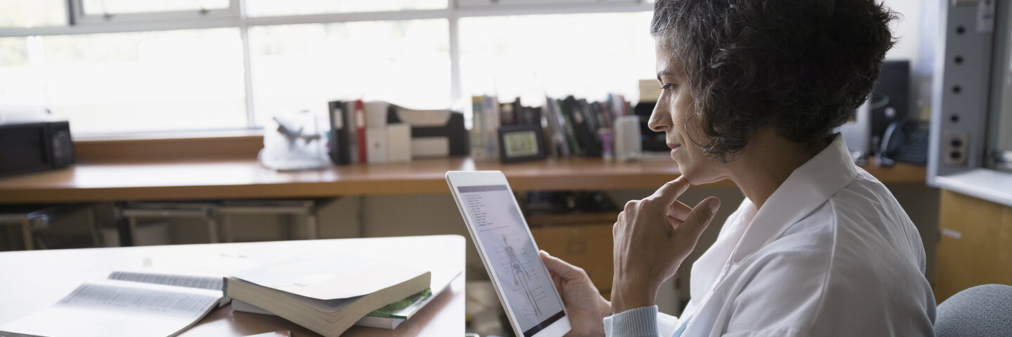 teacher planning at her desk