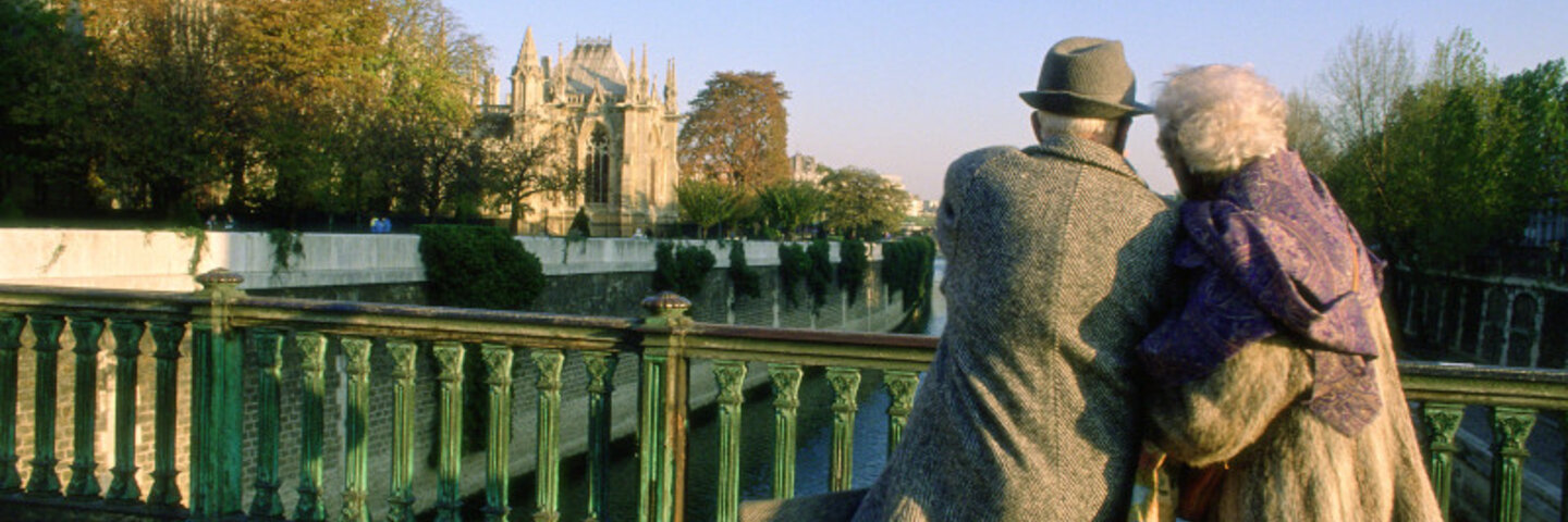 couple walking on a bridge