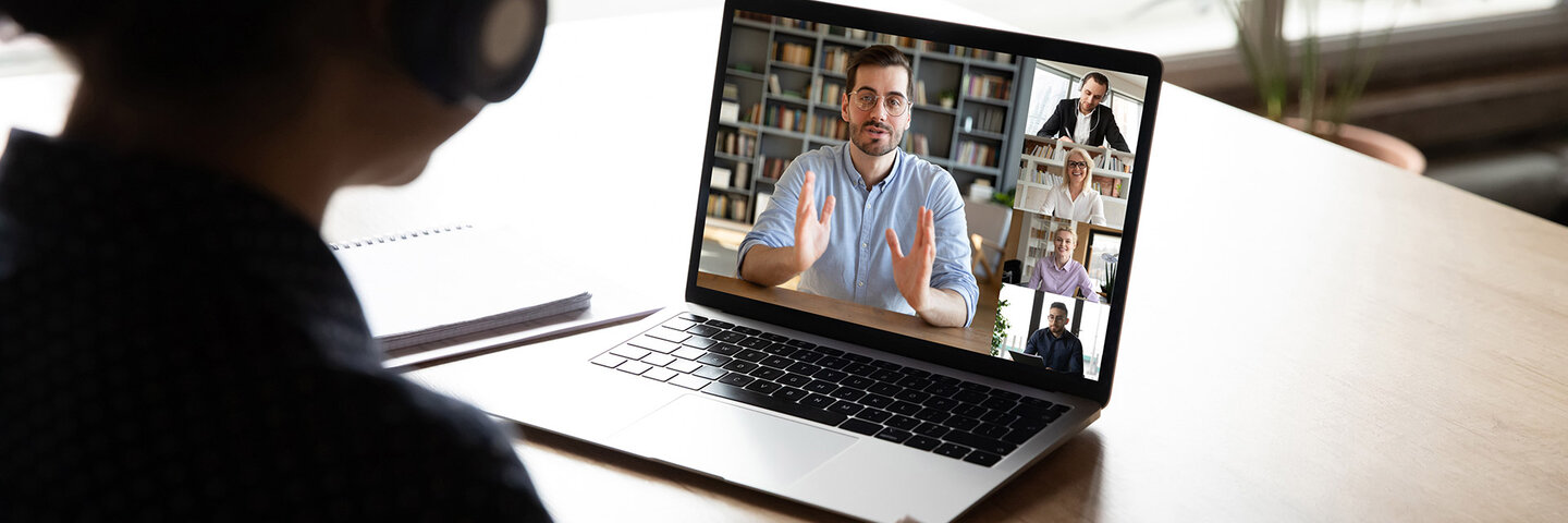 Person watching a zoom meeting with 5 other people