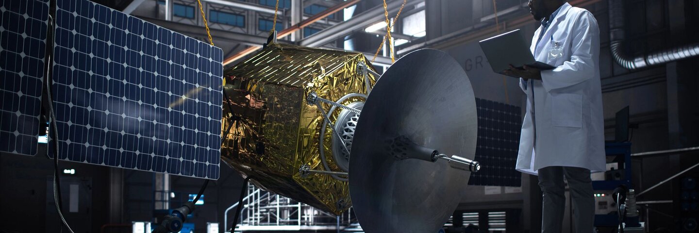 Engineering working with a satellite