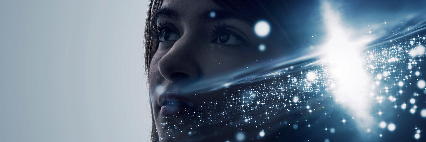 Woman looking into the distance with space image super-imposed on her shadow