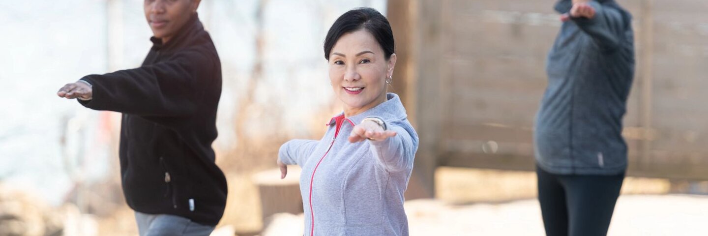 Senior Best friends Doing Qigong