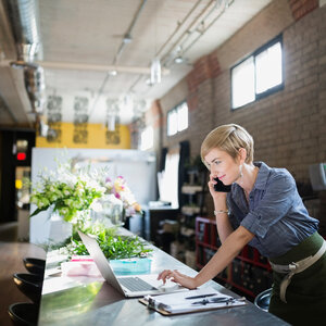 woman business owner at her computer