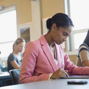 A woman studying at a desk